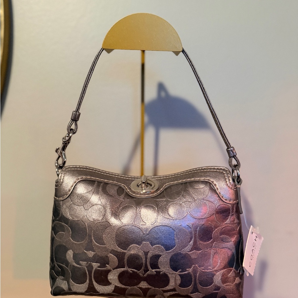 Coach Metallic Silver wristlet